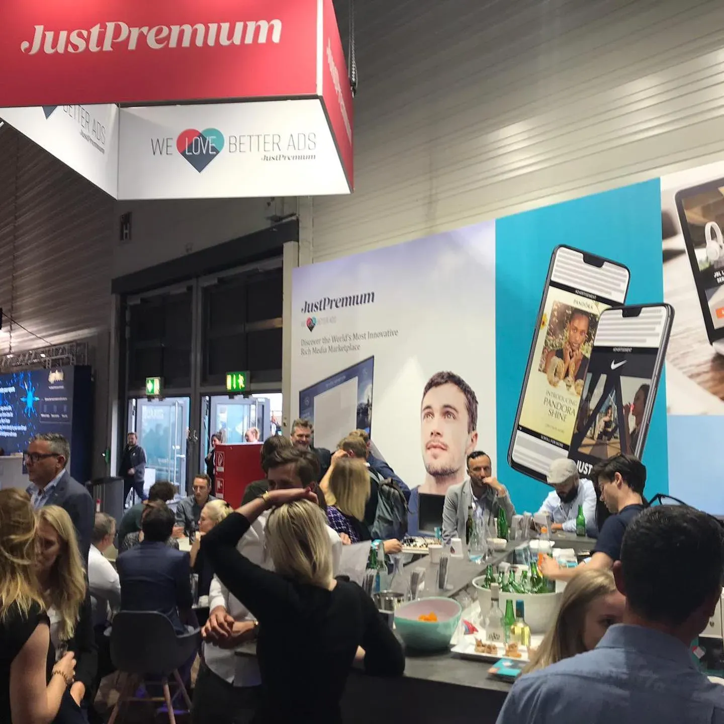 Photo from event, taken in booth showing the busy space